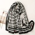 Classic black and white scarf with vintage carriage print and red striped border - Black Red