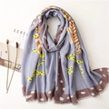 Abstract zebra print linen scarf in light purple with frayed edges and artistic dots - Blue Purple Orange