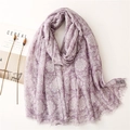 Purple scarf with white floral paisley print and fringe detail on white background - Purple