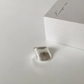 Close-up of a minimalist silver glossy wide ring with mirror finish and gift box - C-56 Silver Glossy (Wide Irregular Style)
