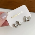 Pair of chunky silver C-shape hoop earrings with polished metallic finish on card - Multi-layer Stud Earrings / Silver