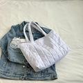 White quilted puffer tote bag with square embroidery pattern and spacious design - White