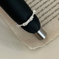 Elegant silver bamboo joint ring with sparkling zircon inlays on a stylish black leather stand - Adjustable Open / Silver