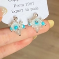 Elegant flower petal earrings with light blue resin and turquoise beads for women - Blue Turquoise Cat's Eye Stud Earrings