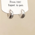 Macro view of textured 925 silver hoop earrings with faceted diamond-like finish - Sparkling Texture Hoop Earrings (A-65) / Silver