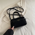 Chic black faux suede tote bag with decorative buckle and golden metal hardware - Black