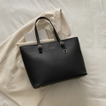 Classic black Saffiano leather tote bag with gold hardware and brand logo lettering - Black