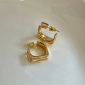 Detailed close-up of gold minimalist square hoop earrings with a high-shine mirror finish - Square Gold Earrings