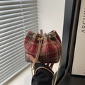 Red plaid wool bucket bag with gold chain strap and elegant pearl charm for winter - Red