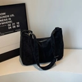 Minimalist black suede hobo bag with silver zipper and adjustable shoulder strap - Obsidian Black