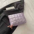 Minimalist purple quilted cosmetic pouch with puffy nylon texture and black zipper - Purple