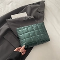 Dark green quilted nylon cosmetic bag with square stitching and black zipper closure - Green