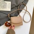 Chic camel faux leather underarm bag with litchi texture and cute monster charm - With Pendant / Khaki