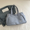 Light blue large nylon tote bag with dual front pockets and fashion textile label - Blue