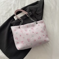 Pink floral bucket bag with chain strap and bow print on textured fabric surface - No Pendant / Pink