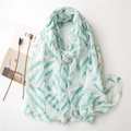Blue geometric linen scarf for women with tassels, ideal for beach sun protection - Blue Geometric Style