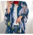 Navy blue linen scarf with large white floral print for sun protection and beach wear - Blue