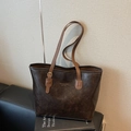 Vintage dunkelbraune Leder-Shopper-Tasche mit goldener Aufschrift auf Büchern - Braun