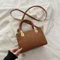 Brown patchwork handbag with suede finish and woven handle for women’s fashion - Brown