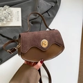 Vintage brown leather crossbody bag with wave flap and golden rotary buckle - Brown