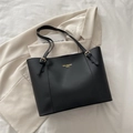 Borsa tote minimalista in pelle nera opaca con scritta Tidal Dryness per uso quotidiano - Nero