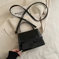 Retro black patent leather crossbody bag with gold hardware and removable shoulder strap - Black