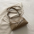 Chic khaki glossy hobo shoulder bag featuring silver metal buckles and eyelet details - Khaki
