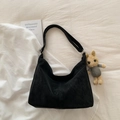 Black suede hobo bag with wide shoulder strap and cute plush rabbit charm accessory - Black With Pendant