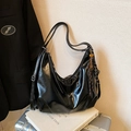 Chic black glossy faux leather hobo bag with adjustable strap and tennis racket charm - With Pendant / Black