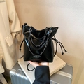 Minimalist black glossy bucket bag with metal chain strap and fashion typography - Black / No Pendant