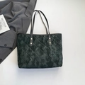 Quilted tote bag in dark green marble print with rhombic pattern and gold rivets - Black