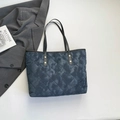Navy blue quilted tote bag with marble tie-dye pattern and slim black straps - Blue