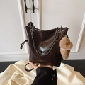 Dark brown glossy leather bucket bag with chain straps and cute teddy bear charm - Coffee / With Pendant