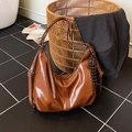 Retro glossy brown faux leather hobo bag for women featuring large capacity and slouchy style - With Pendant / Brown