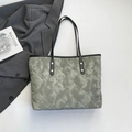 Quilted tote bag in grey-green marble print with black leather straps and gold rivets - Green