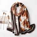 Lightweight long shawl with artistic horse print and brown border in a flat lay setup - Coffee (SL2004-068)