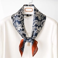 Elegant navy blue paisley silk scarf with orange borders on a white shirt - Navy Blue