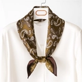 Detail of silk scarf with classic olive green paisley pattern on a white shirt - Army Green