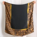 Large square scarf with classic leopard print, chains, and belt pattern in black and gold - Black