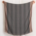Full view of lightweight shawl featuring black, white, and brown wavy geometric patterns - Black (SL1909-040)