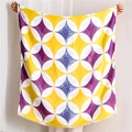 Detail of a large square scarf with yellow and purple geometric patterns and frayed edges - 180x90cm / Purple Yellow Geometric Patchwork (SL1910-008)