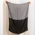 Detail of herringbone print scarf with lightweight black chiffon splice finish - Black