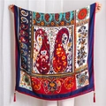 Detail of red paisley cotton linen scarf featuring handmade wooden beads and tassels - Blue