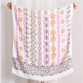 Detailed view of bohemian floral cotton linen shawl with colorful ethnic patterns - Rose Red
