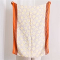 Detail of thin cotton linen shawl with orange Greek key border and floral pattern - 180x70cm / Orange