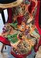 Ethnic floral cotton linen scarf with vibrant prints and black beaded tassels - Multicolor