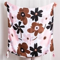 Detail of floral print scarf featuring pink tassel trim and light linen texture - Pink Floral Print (SL1904-104)