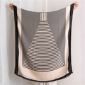 Detail of thin woven scarf with beige and black geometric stripes and wide border - Beige