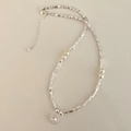 French style silver necklace with pearls and zircon pendant on light gray background - B-56 Crushed Silver Pearl Zirconia Necklace