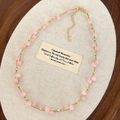 Detail of pink natural stone beaded double-layer necklace with gold-plated lobster clasp - Pink Natural Stone Necklace